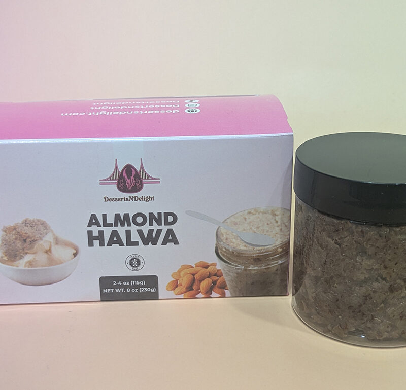 DessertsNDelight Almond Halwa packaging box with a pink and beige design.